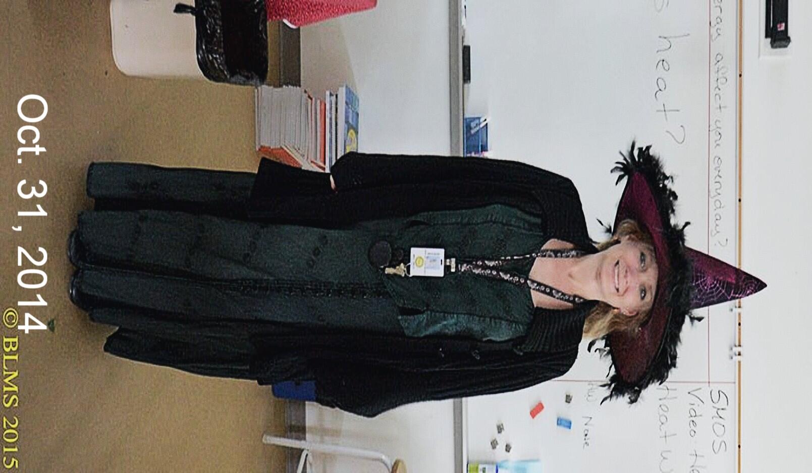 Mrs. Smith dressed as a witch. 